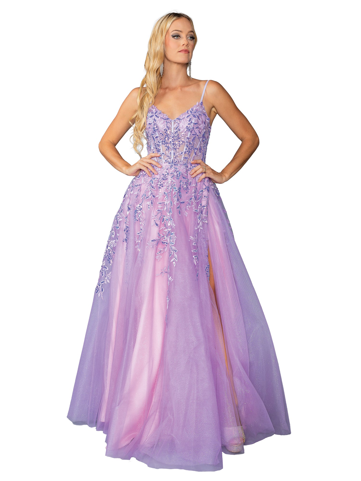 A woman wears the Dancing Queen 4452 Long Glitter Prom Ball Gown, a floor-length lavender A-line dress with floral embroidery, thin straps, and a lace-up open back.